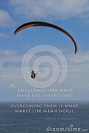 Challenges and paraglider Stock Photo