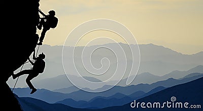 Challenging rock climbing and accompanying friends Stock Photo