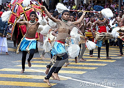 Chamara Dancers perform along the streets of Kandy during the Day Perahera in Sri Lanka. Editorial Stock Photo