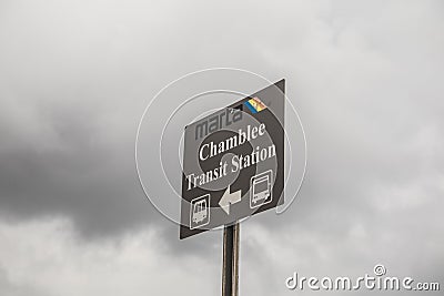 Marta Chamblee Transit Station sign with dark clouds Editorial Stock Photo
