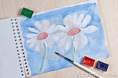 Chamomile with watercolor paint Stock Photo