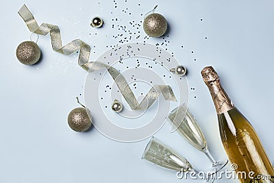 a bottle of champagne and silver christmas ornam Stock Photo