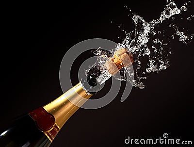 Champagne bottle eruption Stock Photo