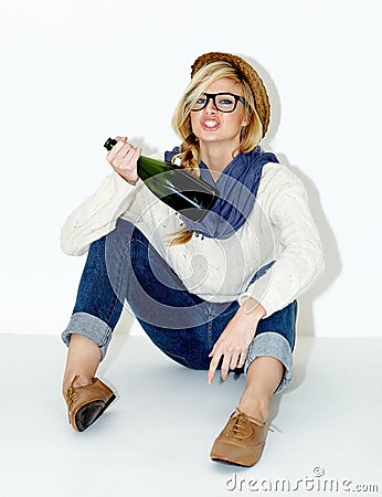 Champagne, drunk or woman on floor with hangover from hipster, rebel or event in studio. Relax, festive or female person Stock Photo