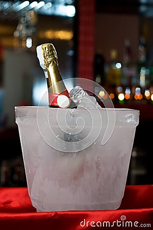Champagne encased in ice Stock Photo