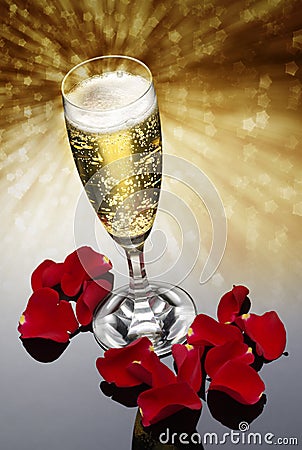 Champagne Glass and Rose Petals Stock Photo