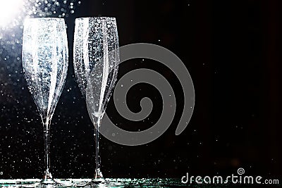 Champagne glasses on black spray Stock Photo