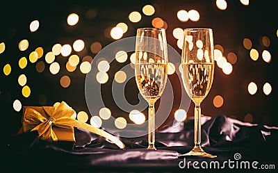 Champagne glasses on bokeh background Stock Photo