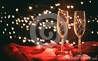 Champagne glasses on hearts bokeh background Stock Photo