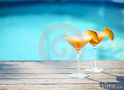 Champagne glasses with peach Bellini cocktail Stock Photo