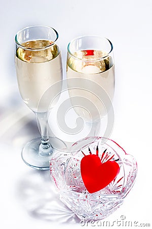 Champagne and plastic heart Stock Photo