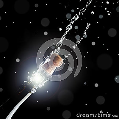 Champagne with popping cork Stock Photo