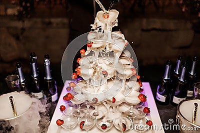 Champagne pyramid at wedding party Stock Photo