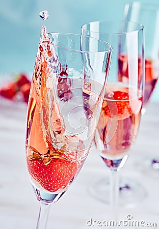 Champagne and strawberry splash Stock Photo