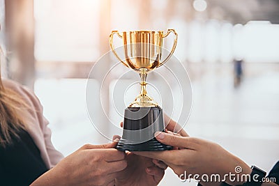 Champion golden trophy for winner background. Success and achievement concept. Sport and cup award theme. Best business Stock Photo