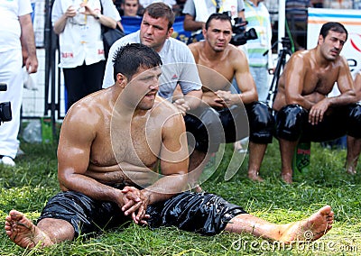 Champion wrestler Recep Kara at the Kirkpinar Turkish Oil Wrestling Festival in Edirne in Turkey. Editorial Stock Photo
