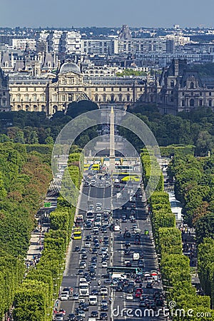 Champs Elysees Luxor Obelisk and Louvre Museum Stock Photo