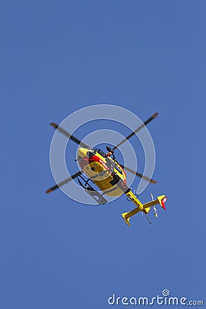 Rescue copter on a blue sky background vertical view Editorial Stock Photo