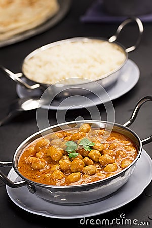 Chana Masala, Chickpeas in a Spicy Curry Sauce, with Rice Stock Photo