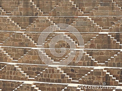 Chand Baori, a stepwell in the village of Abhaneri near Jaipur, state of Rajasthan. Chand Baori was built by King Chanda of the Stock Photo