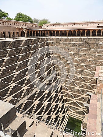 Chand Baori well, stepwell in Abhaneri Village near Jaipur, Rajasthan. Chand Baori was built by king Chanda of the Nikumbha Stock Photo