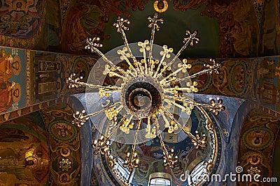 Chandelier and ceiling mosaics in orthodox Church of the Savior, Saint Petersburg, Russia Editorial Stock Photo