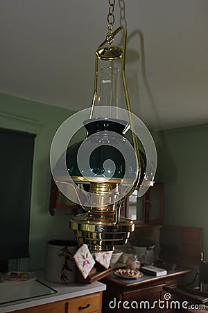 Chandelier with Light Shades inside Amish House Stock Photo