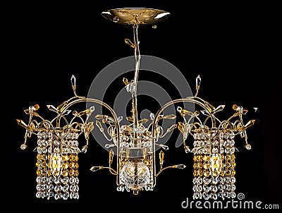 Chandelier for a modern interior. crystal chandelier for hallway, living room or bedroom. Isolated on black background. Stock Photo