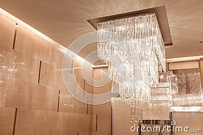Chandelier with warm and vintage tone for interiors design. Stock Photo