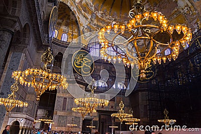 Chandeliers, domes and murals in magnificent and beautiful famous Hagia Sophia mosque Editorial Stock Photo