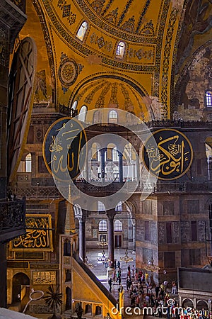 Chandeliers, domes and murals in magnificent and beautiful famous Hagia Sophia mosque Editorial Stock Photo