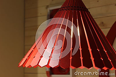 Chandeliers made of red lacquered wood panels Stock Photo