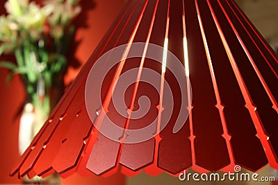 Chandeliers made of red lacquered wood panels Stock Photo