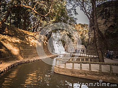 Chandigarh, India; November 5, 2019: Peoples are enjoying near water fall in rock garden Editorial Stock Photo