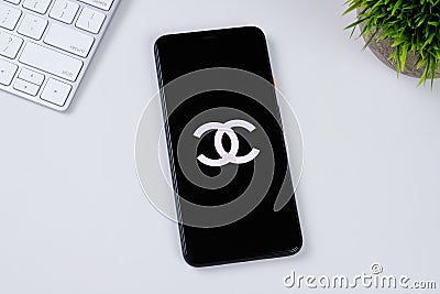 Chanel Fashion app logo on a smartphone screen. Editorial Stock Photo