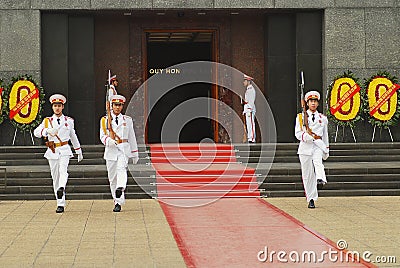 Change of honor guards at the entrance to the Ho Chi Minh mausoleum in Hanoi, Vietnam. Editorial Stock Photo