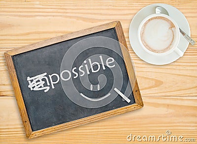Change impossible to possible on chalkboard Stock Photo