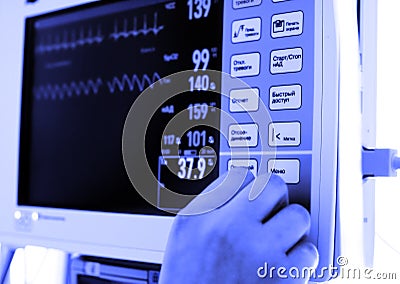Change the settings of medical monitor Stock Photo