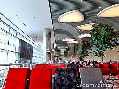 Changi,Singapore - January 12,2020 : seats at airport terminal 4 departures in font of gate G2 Editorial Stock Photo