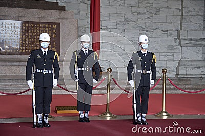 Changing of the guards ceremony against the statue of Chiang Kai-Shek in memorial hall Editorial Stock Photo
