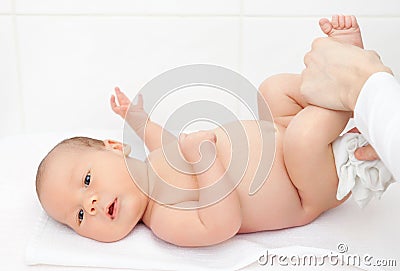 Changing nappies for an adorable little newborn Stock Photo