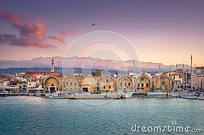 Chania with the amazing lighthouse, at sunset, Crete, Greece. Stock Photo