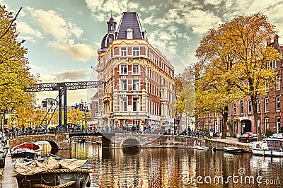 Channel in Amsterdam Netherlands houses river Amstel Stock Photo