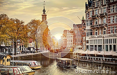 Channel in Amsterdam Netherlands houses river Amstel landmark old european city spring landscape. Stock Photo