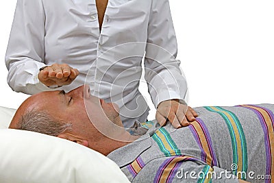 Channeling healing energy to male Stock Photo