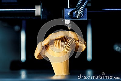 Chanterelle in a 3D printer, concepts such as food scarcity Stock Photo