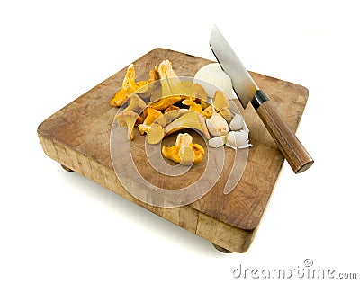 Chanterelles on a cutting board Stock Photo