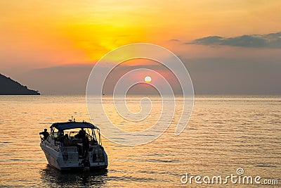 CHANTHABURI, THAILAND - December 10, 2016 : Speed boat will drive to the sea while sunset at Ao Yang Beach , Chanthaburi Editorial Stock Photo