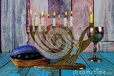Chanukah candles all a jewish symbol with kosher wine celebration and kipah Stock Photo