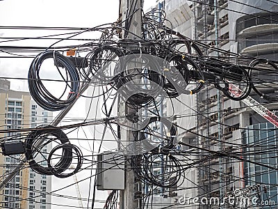 The chaos of cables and wires on every street Stock Photo